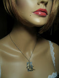 Sterling silver bird pendant with Apatite gemstone - Dream
