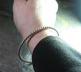 Thick sterling bangle - Silver Twist